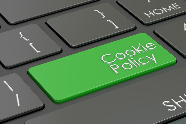 Cookie policy words on laptop keyboard